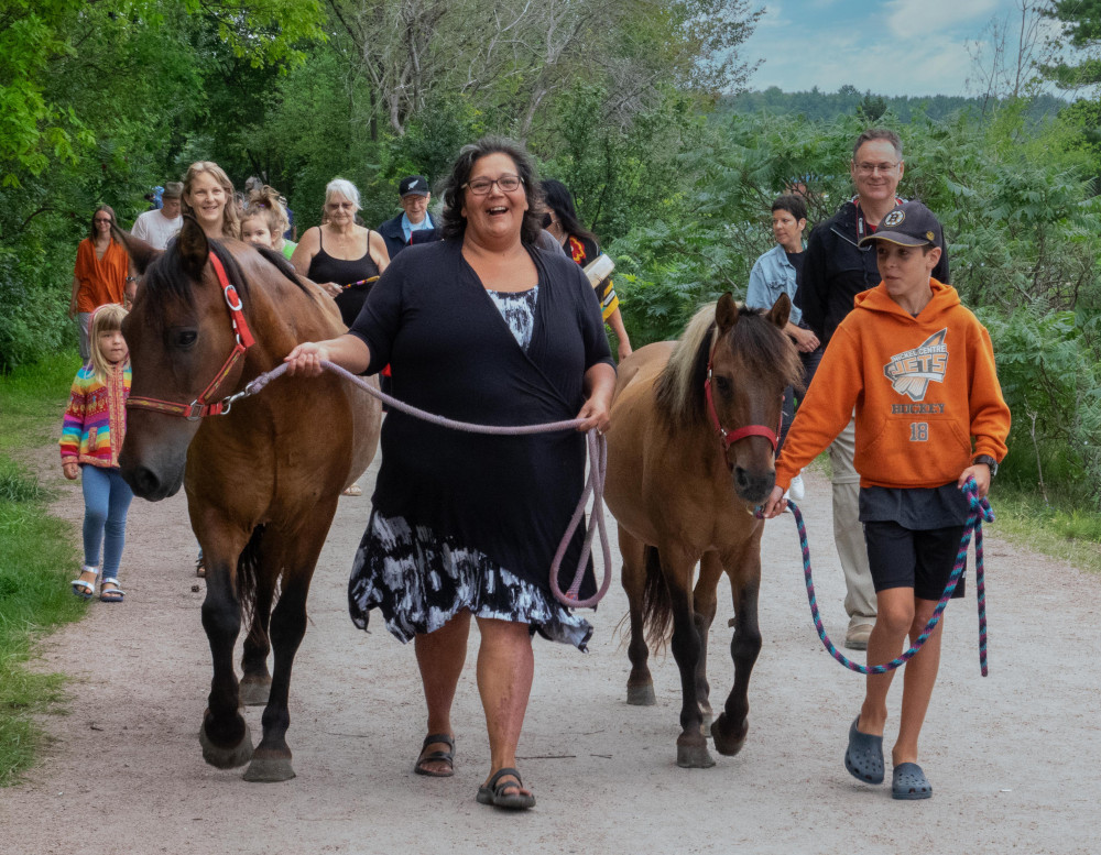 In their traditional territories once more, these Ojibwe Horses are being led by Jodi Contin on a spirit walk for the whole community in Parry Sound.
