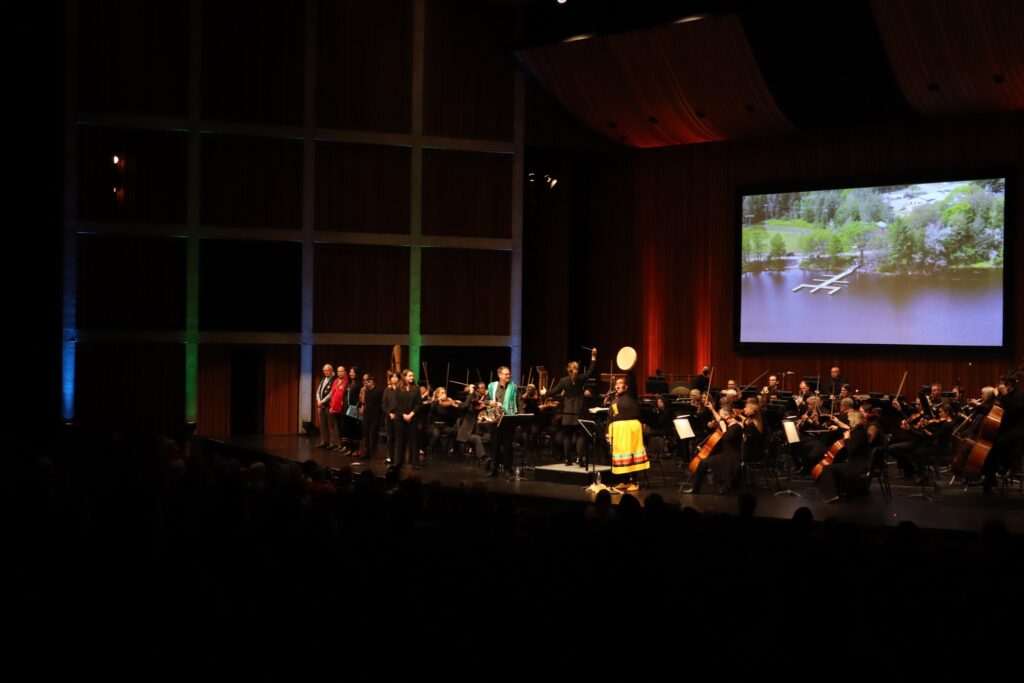 Image from the final scene of "The Spirit Horse Returns" with the Hamilton Philharmonic Orchestra conducted by Gemma New, 2022.